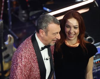 SANREMO, ITALY - FEBRUARY 09: Amadeus and Matilda De Angelis attend the 74th Sanremo Music Festival 2024 at Teatro Ariston on February 09, 2024 in Sanremo, Italy. (Photo by Daniele Venturelli/Daniele Venturelli/Getty Images )