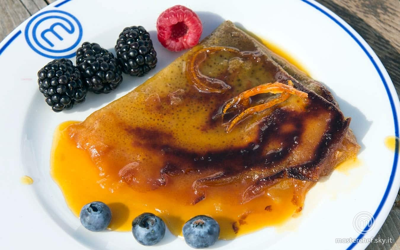 Crêpes suzette flambé con arance caramellate