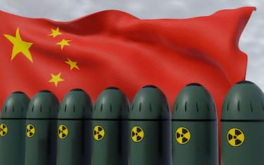 Nuclear missiles and China flag in background. Missiles with warheads are ready to be launched. missile defense. Nuclear, chemical weapons. radiation.