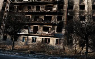 IZYUM, UKRAINE - JANUARY 11: A building stands destroyed in the heavily damaged town of Izyum on January 11, 2023 in Izyum, Ukraine. Izyum was occupied by the Russian military following the invasion of Ukraine and was heavily damaged in the subsequent fighting. Few people still live in the area which now has electricity but little infrastructure.  As the one year anniversary of the war in Ukraine approaches, fighting still continues throughout the East of the country.  (Photo by Spencer Platt/Getty Images)