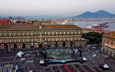 A panoramic view of Piazza del Plebiscito in Naples with the stage set up for the representation of the 'Tosca', opening, outdoors due to the pandemic from Covid- 19 , of the 2020 season of the San Carlo Theater, 23 July 2020 ANSA / CIRO FUSCO