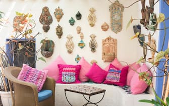 Pillows painted by Giovanna Palimodde in the acquasantiere corner at Hotel Su Gologone in Oliena