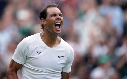 Rafael Nadal celebrates winning his Gentlemen's Singles fourth round match against Botic van de Zandschulp on day eight of the 2022 Wimbledon Championships at the All England Lawn Tennis and Croquet Club, Wimbledon. Picture date: Monday July 4, 2022. (Photo by Zac Goodwin/PA Images via Getty Images)
