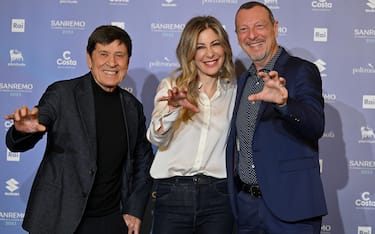 Sanremo Festival host and artistic director Amadeus (R), Italian journalist and television presenter Francesca Fagnani (C) and Italian singer and Sanremo Festival co-host Gianni Morandi (L) pose during a photocall on the occasion of the 73rd Sanremo Italian Song Festival, in Sanremo, Italy, 08 February 2023. The music festival will run from 07 to 11 February 2023.  ANSA/ETTORE FERRARI
