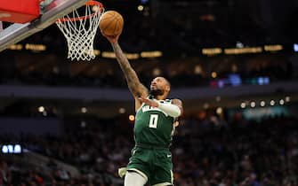 MILWAUKEE, WISCONSIN - NOVEMBER 26: Damian Lillard #0 of the Milwaukee Bucks drives to the basket during the first half of a game against the Portland Trail Blazers at Fiserv Forum on November 26, 2023 in Milwaukee, Wisconsin. NOTE TO USER: User expressly acknowledges and agrees that, by downloading and or using this photograph, User is consenting to the terms and conditions of the Getty Images License Agreement. (Photo by Stacy Revere/Getty Images)