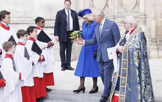 King Charles III and the Queen Consort speak to choristers as they depart after attending the annual Commonwealth Day Service at Westminster Abbey in London. Picture date: Monday March 13, 2023. (Photo by Belinda Jiao/PA Images via Getty Images)