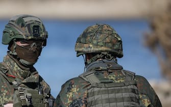 Soldiers of the German armed forces Bundeswehr take part in the international military exercise  "Wettiner Schwert 2024" (Wettin Sword 2024) in Hohengoehren, near Tangermunde, eastern Germany, on March 26, 2024. The NATO exercise "Wettiner Schwert 2024" is part of the "Quadriga 2024" exercise of the German armed forces Bundeswehr. (Photo by Ronny Hartmann / AFP)