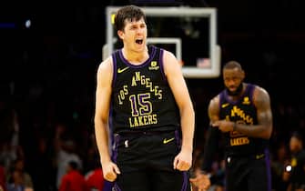 LOS ANGELES, CALIFORNIA - DECEMBER 05:  Austin Reaves #15 of the Los Angeles Lakers celebrates a three-point shot against the Phoenix Suns in the second half during the 2023 NBA In-Season Tournament quarterfinals at Crypto.com Arena on December 05, 2023 in Los Angeles, California.  NOTE TO USER: User expressly acknowledges and agrees that, by downloading and/or using this photograph, user is consenting to the terms and conditions of the Getty Images License Agreement. (Photo by Ronald Martinez/Getty Images)