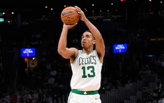 BOSTON, MA - OCTOBER 2: Malcolm Brogdon #13 of the Boston Celtics shoots a three point basket during the game against the Charlotte Hornets on October 2, 2022 at the TD Garden in Boston, Massachusetts.  NOTE TO USER: User expressly acknowledges and agrees that, by downloading and or using this photograph, User is consenting to the terms and conditions of the Getty Images License Agreement. Mandatory Copyright Notice: Copyright 2022 NBAE  (Photo by Brian Babineau/NBAE via Getty Images)