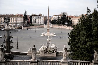 A view of the empty Piazza del Popolo square during the emergency blockade of Covon-19 Coronavirus in Rome, Italy, 17 March 2020. ANSA/ANGELO CARCONI