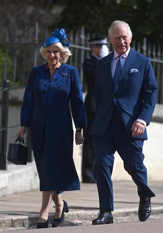epa10565988 Britain's King Charles III (R) and Camilla, the  Queen Consort arrive for the Easter Sunday service at St Georges Chapel at Windsor Castle in Windsor, Britain, 09 April 2023.  EPA/NEIL HALL