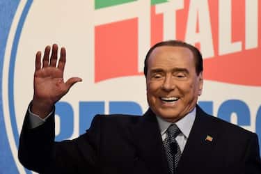 Former Italian Prime Minister and leader of the Forza Italia party Silvio Berlusconi gestures during a rally in Rome on March 9, 2022. (Photo by FILIPPO MONTEFORTE / AFP) (Photo by FILIPPO MONTEFORTE/AFP via Getty Images)