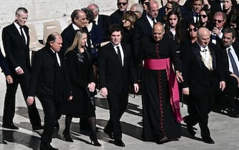 Argentina's President Javier Milei (C) walks with his sister Karina Milei (2L) as they arrive ahead of the late Pope Francis' funeral ceremony at St Peter's Square at The Vatican on April 26, 2025. (Photo by Filippo MONTEFORTE / AFP) (Photo by FILIPPO MONTEFORTE/AFP via Getty Images)          