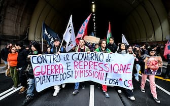 Protestors during a rally held next to Prefecture of Genoa to contest ministers Matteo Piantedosi and Matteo Salvini after Pisa clashes in Genoa, Italy, 4 March 2024. ANSA/SIMONE ARVEDA
