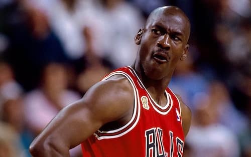 SEATTLE - JUNE 14:  Michael Jordan #23 of the Chicago Bulls displays emotion in Game Five of the 1996 NBA Finals against the Seattle SuperSonics at Key Arena on June 14, 1996 in Seattle, Washington. The Sonics won 89-78.  NOTE TO USER: User expressly acknowledges that, by downloading and or using this photograph, User is consenting to the terms and conditions of the Getty Images License agreement. Mandatory Copyright Notice: Copyright 1996 NBAE (Photo by Andrew D. Bernstein/NBAE via Getty Images)