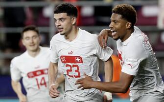 epa10721581 Switzerland's Zeki Amdouni (C) celebrates scoring the equalizer during the UEFA Under-21 Championship quarter final match between Spain and Switzerland in Bucharest, Romania, 01 July 2023.  EPA/ROBERT GHEMENT