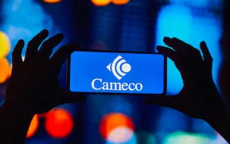 In this photo illustration, the Cameco Corporation logo is displayed on a smartphone screen.