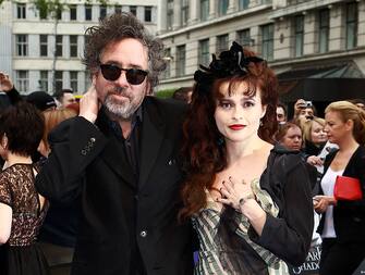 LONDON, UNITED KINGDOM - MAY 09: Tim Burton and Helena Bonham-Carter attend  the European premiere of Dark Shadows at Empire Leicester Square on May 9, 2012 in London, England. (Photo by Fred Duval/FilmMagic)