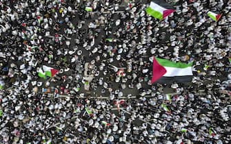 JAKARTA, INDONESIA - JANUARY 13: An aerial view of people took action to commemorate the 100th day of the Israeli attack on Gaza outside the United States Embassy, Jakarta, Indonesia on Saturday, January 13, 2024. This action to defend Palestinian people was carried out to ask the world to immediately stop the war in Gaza since Oct. 7th which has killed over 23,000 Palestinians. (Photo by Eko Siswono Toyudho/Anadolu via Getty Images)