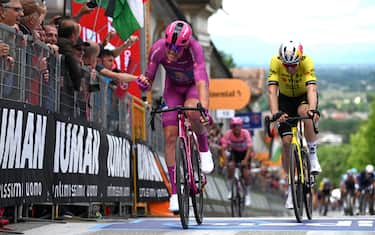 VICENZA, ITALY - MAY 23: (L-R) Mads Pedersen of Denmark and Team Lidl - Trek - Purple Points Jersey celebrates at finish line as stage winner ahead of Wout Van Aert of Belgium and Team Visma | Lease a Bike during the 108th Giro d'Italia 2025, Stage 13 a 180km stage from Rovigo to Vicenza / #UCIWT / on May 23, 2025 in Vicenza, Italy. (Photo by Dario Belingheri/Getty Images)
