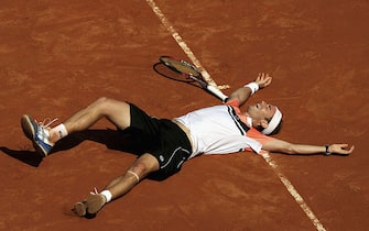 ROME - MAY 10:  Filippo Volandri of Italy celebrates match-point against Roger Federer of Switzerland  in their third round match, during the ATP Masters Series at the Foro Italico, May 10, 2007 in Rome, Italy. (Photo by Clive Brunskill/Getty Images)  