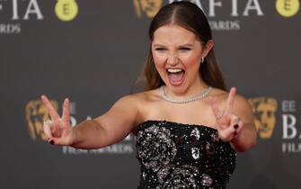 epa11164084 Mia Mckenna-Bruce attends the 2024 EE BAFTA Film Awards at the Royal Festival Hall in London, Britain, 18 February 2024. The ceremony is hosted by the British Academy of Film and Television Arts (BAFTA).  EPA/NEIL HALL