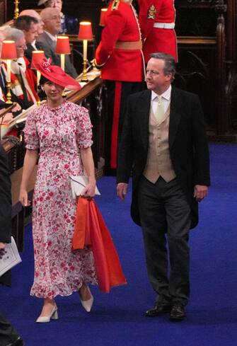 LONDON, ENGLAND - MAY 06: Former British Prime Minister David Cameron and his wife Samantha ahead of the Coronation of King Charles III and Queen Camilla on May 6, 2023 in London, England. The Coronation of Charles III and his wife, Camilla, as King and Queen of the United Kingdom of Great Britain and Northern Ireland, and the other Commonwealth realms takes place at Westminster Abbey today. Charles acceded to the throne on 8 September 2022, upon the death of his mother, Elizabeth II. (Photo by Phil Noble - WPA Pool/Getty Images)