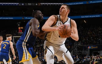 SAN FRANCISCO, CA - FEBRUARY 25: Nikola Jokic #15 of the Denver Nuggets handles the ball during the game against the Golden State Warriors on February 25, 2024 at Chase Center in San Francisco, California. NOTE TO USER: User expressly acknowledges and agrees that, by downloading and or using this photograph, user is consenting to the terms and conditions of Getty Images License Agreement. Mandatory Copyright Notice: Copyright 2024 NBAE (Photo by Noah Graham/NBAE via Getty Images)