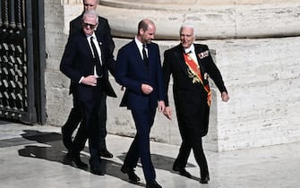 Britain's Prince William (C) arrives ahead of the late Pope Francis' funeral ceremony at St Peter's Square at The Vatican on April 26, 2025. (Photo by Filippo MONTEFORTE / AFP) (Photo by FILIPPO MONTEFORTE/AFP via Getty Images)          