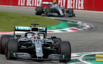 MONZA, ITALY - SEPTEMBER 08: Lewis Hamilton of Great Britain driving the (44) Mercedes AMG Petronas F1 Team Mercedes W10 leads Valtteri Bottas driving the (77) Mercedes AMG Petronas F1 Team Mercedes W10 on track during the F1 Grand Prix of Italy at Autodromo di Monza on September 08, 2019 in Monza, Italy. (Photo by Charles Coates/Getty Images)