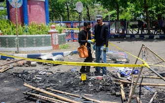 Danni fuori dallo stadio di Malang