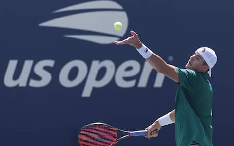 epa10831484 John Isner of the United States returns the ball to Michael Mmoh of the United States during their second round match at the US Open Tennis Championships at the USTA National Tennis Center in Flushing Meadows, New York, USA, 31 August 2023. The US Open runs from 28 August through 10 September.  EPA/CJ GUNTHER