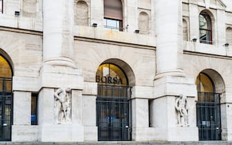 The entrance of the Borsa, Mezzanotte Palace, 20th-century building seat of the Italian stock exchange, located in Piazza Affari, Milan, Italy