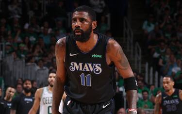 BOSTON, MA - JUNE 6: Kyrie Irving #11 of the Dallas Mavericks looks on during the game against the Boston Celtics during Game 1 of the 2024 NBA Finals on June 6, 2024 at the TD Garden in Boston, Massachusetts. NOTE TO USER: User expressly acknowledges and agrees that, by downloading and or using this photograph, User is consenting to the terms and conditions of the Getty Images License Agreement. Mandatory Copyright Notice: Copyright 2024 NBAE  (Photo by Nathaniel S. Butler/NBAE via Getty Images)