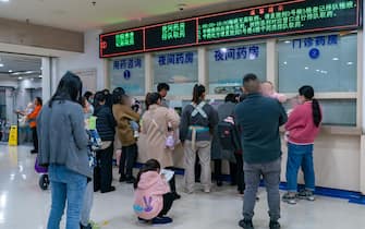 CHONGQING, CHINA - NOVEMBER 23, 2023 - Parents with children suffering from respiratory diseases line up at a children's hospital in Chongqing, China, November 23, 2023. (Photo by CFOTO/Sipa USA)
