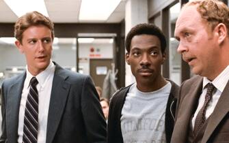 USA. Eddie Murphy, John Ashton and Judge Reinhold  in a scene from the ©Paramount Pictures movie: Beverly Hills Cop (1984).
Plot: A freewheeling Detroit cop - Axel Foley , pursuing a murder investigation finds himself dealing with the very different culture of Beverly Hills. 
Ref:  LMK110-J6744-170820
Supplied by LMKMEDIA. Editorial Only.
Landmark Media is not the copyright owner of these Film or TV stills but provides a service only for recognised Media outlets. pictures@lmkmedia.com