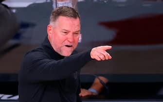 LAKE BUENA VISTA, FLORIDA - AUGUST 30: Michael Malone of the Denver Nuggets yells to his team against the Utah Jazz during the second quarter in Game Six of the Western Conference First Round during the 2020 NBA Playoffs at AdventHealth Arena at ESPN Wide World Of Sports Complex on August 30, 2020 in Lake Buena Vista, Florida. NOTE TO USER: User expressly acknowledges and agrees that, by downloading and or using this photograph, User is consenting to the terms and conditions of the Getty Images License Agreement. (Photo by Kevin C. Cox/Getty Images)