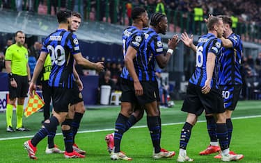 Marcus Thuram of FC Internazionale celebrates with his team mates after scoring a goal during UEFA Champions League 2024/25 Round of 16 - 2nd leg football match between FC Internazionale and Feyenoord Rotterdam at San Siro Stadium