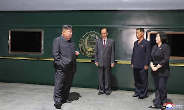 epa12344642 A photo released by the official North Korean Central News Agency (KCNA) shows North Korean leader Kim Jong Un (L) standing by his private train before departing for Beijing in Pyongyang, North Korea, 01 September 2025 (issued 02 September 2025). The North Korean leader departed on 01 September on his private train to Beijing to attend celebrations marking the 80th anniversary of the victory of the Chinese People