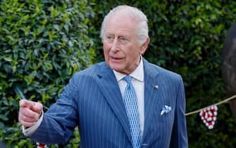 Britain's King Charles III and Queen Camilla during a meeting with the British community in Villa Wolkonsky, Rome, Italy 8 April 2025. ANSA/FABIO FRUSTACI
