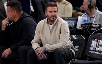 (from L) Former football players Ronaldo from Brazil and David Beckham form England attend the NBA regular season basketball match between the Cleveland Cavaliers and the Brooklyn Nets at the Accor Arena in Paris on January 11, 2024. (Photo by Emmanuel Dunand / AFP)