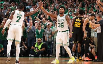 BOSTON, MA - JUNE 8: Jaylen Brown #7 and Marcus Smart #36 of the Boston Celtics embrace during Game Three of the 2022 NBA Finals on June 8, 2022 at TD Garden in Boston, Massachusetts. NOTE TO USER: User expressly acknowledges and agrees that, by downloading and or using this photograph, user is consenting to the terms and conditions of Getty Images License Agreement. Mandatory Copyright Notice: Copyright 2022 NBAE (Photo by Nathaniel S. Butler/NBAE via Getty Images)