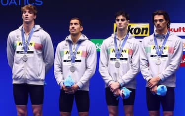 FUKUOKA, JAPAN - JULY 23:  Silver medallists Alessandro Miressi,  Manuel Frigo, Lorenzo Zazzeri and Thomas Ceccon of Team Italy pose during the medal ceremony for the Men's 4 x 100m Freestyle Relay Final on day one of the Fukuoka 2023 World Aquatics Championships at Marine Messe Fukuoka Hall A on July 23, 2023 in Fukuoka, Japan. (Photo by Clive Rose/Getty Images)