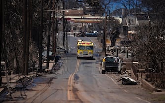 epaselect epa10796009 A fire department truck patrols a neighborhood destroyed by a wild fire in Lahaina, Hawaii, USA, 11 August 2023. At least 67 people were killed in the wildfires burning in Maui, which is considered the largest natural disaster in Hawaii's state history.  EPA/ETIENNE LAURENT