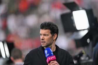 German former football player Michael Ballack speaks on television before the UEFA Euro 2024 final football match between Spain and England at the Olympiastadion in Berlin on July 14, 2024. (Photo by Kirill KUDRYAVTSEV / AFP) (Photo by KIRILL KUDRYAVTSEV/AFP via Getty Images)