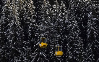This photograph shows cable car cabins in Alta Badia, on December 18, 2022. (Photo by Tiziana FABI / AFP) (Photo by TIZIANA FABI/AFP via Getty Images)