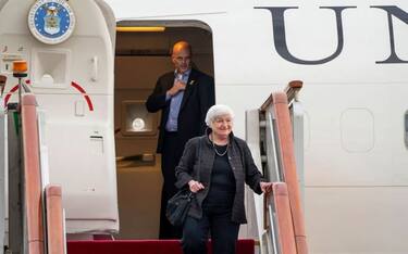 US Treasury Secretary Janet Yellen (R) arrives at Beijing Capital International Airport in Beijing on July 6, 2023. Yellen arrived in Beijing on July 6 kicking off a visit aimed at improving communication and stabilising the tense relationship between the world's two largest economies. (Photo by Mark Schiefelbein / POOL / AFP) (Photo by MARK SCHIEFELBEIN/POOL/AFP via Getty Images)