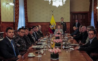 epa11066716 A handout photo made available by the Presidency of Ecuador shows the Ecuadorian President Daniel Noboa (C), during a meeting with the Council of Public and State Security (COSEPE), at the Government Palace in Quito, Ecuador, 09 January 2024. The head of the Joint Command of the Armed Forces of Ecuador, Jaime Vela, assured that they will not retreat or negotiate with groups that intend to instill terror in the population, at the end of the Security Council, chaired by the Ecuadorian president, Daniel Noboa.  EPA/Presidency of Ecuador / HANDOUT  HANDOUT EDITORIAL USE ONLY/NO SALES HANDOUT EDITORIAL USE ONLY/NO SALES