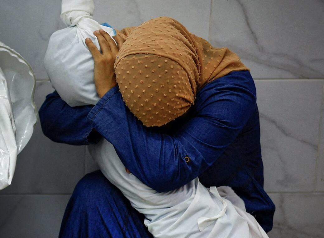 001_World_Press_Photo_of_the_Year_Mohammed_Salem_Reuters.jpg
