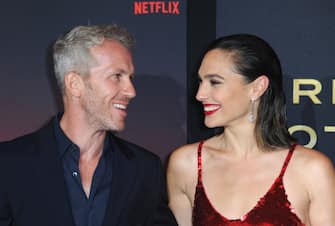 LOS ANGELES, CA - NOVEMBER 03:  Gal Gadot and husband  Yaron Varsano arrive for the World Premiere Of Netflix's "Red Notice" held at L.A. LIVE on November 3, 2021 in Los Angeles, California.  (Photo by Albert L. Ortega/Getty Images)